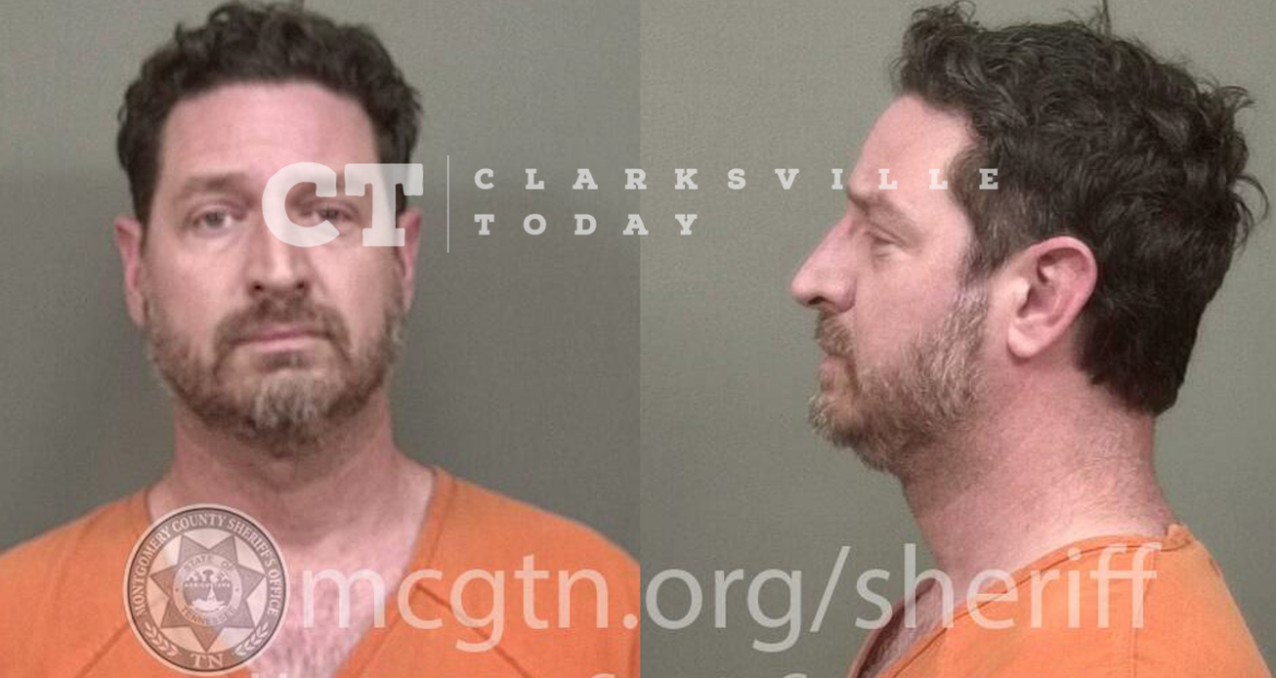 Daniel Dennis shoves wife & threatens to hit her during argument